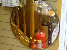 Pink circular Art Deco wall mirror