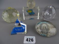 Collection of advertising and other paperweights, one showing the gigantic wheel at Blackpool