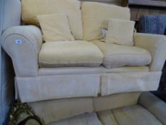 Textured lemon coloured three seater and two seater sofas
