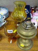 Vintage style candle lamp, brass spirit lamp base and an amber glass goblet with twist stem