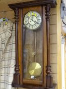 Walnut cased Vienna style regulator wall clock, twin weight with pendulum