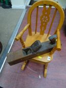 Small light wood rocking chair and a vintage wooden block plane