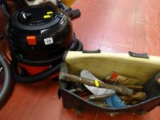 Henry vacuum cleaner and a small assortment of hand tools in a satchel E/T