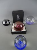 Four Scottish glass paperweights 'Selkirk', 'Caithness' and 'Edinburgh' star shaped millefiori