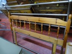 Modern metal framed headboard and a wooden spindle headboard