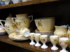 Victorian pottery breakfast set, gilt decorated with flowers and butterflies