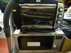 Delonghi stainless steel finish microwave oven and a Bush tabletop oven/grill E/T