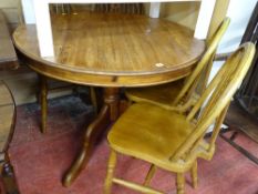 Pine circular single pedestal breakfast table with four spindleback chairs