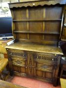 Excellent oak Priory style dresser with two drawers over two base cupboards