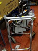 Three wheeled walker and one other