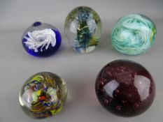 Five good sized vintage paperweights with bubble and swirl inclusion