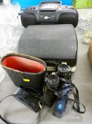 Portable radio and CD player, a cased Brother Deluxe 800 typewriter, a pair of 8x40 binoculars etc