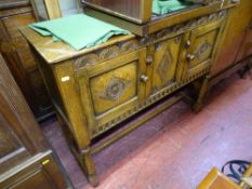 Carved two door hall sideboard