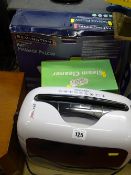 Rexel paper shredder, Easy Steam cleaner, Remington bath massage pillow and a combination lock large