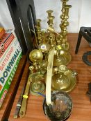 Collection of vintage brass candlesticks, chambersticks and other metalware