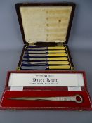 Cased set of pastry knives and a hallmarked silver paperknife replica of a Georgian meat skewer in