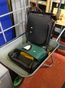 Metal garden wheelbarrow and a 400w lawn raker E/T