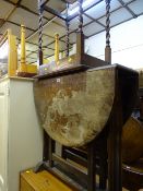 Distressed gate leg table and a square topped occasional table on barley twist supports