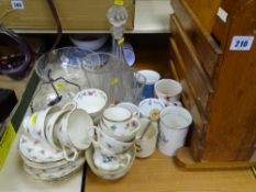 Mixed quantity of glass and china tableware with a modern pine magazine rack