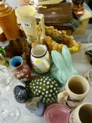 Collection of pottery jugs, planters and rabbit figurines etc