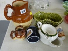 Two stoneware jugs, a Sylvac pottery planter etc