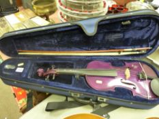 Purple coloured violin with standard bow in a fitted case
