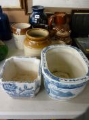 Collection of stoneware jars, jugs and vessels along with two Oriental blue and white planters