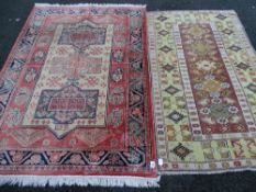 Two vintage style tassel ended carpets