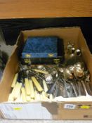 Parcel of mainly unboxed cutlery and two boxes of cutlery, knives and spoons