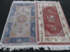 Two Chinese washed woollen rugs