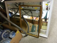 Two vintage bevelled edge wall mirrors