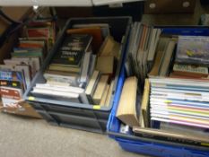 Two plastic crates and a box of vintage and other books