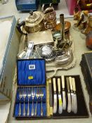 Three piece plated teaset, a two handled tray, an EP cigarette box and other plated ware and