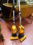 Two similar MAX Dirtbuster vacuum cleaners E/T