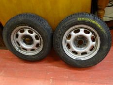 Pair of 51/2J thirteen steel rims with 175/70R13 tyres