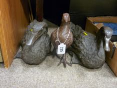 Two metallic garden ducks and a pheasant