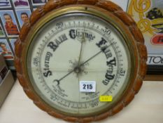 Oak framed aneroid barometer (glass cracked)