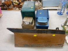 Wooden model of a boat hull and two Louis Marx & Co tinplate trucks