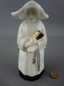 Royal Worcester porcelain candle snuffer in the form of a nun