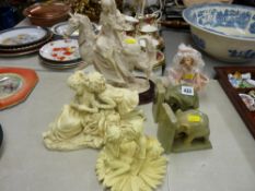 Pair of onyx elephant bookends and four composition display figurines