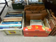 Crate of hobby books and a good quantity of various sheet music in five various wallet type bags and