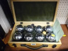 Wooden cased set of eight boules