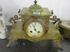 French onyx and gilt metal mantel clock