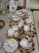 Poppy decorated coffee set, a Colclough china gilt decorated part teaset and a Portmeirion powder