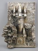 Mexican white metal embossed ornament of a castle turret with trees