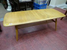 Ercol light wood coffee table with under tier spindle rack