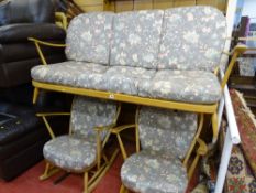 Light Ercol lounge suite of three seater settee and a pair of rocking armchairs, all matching