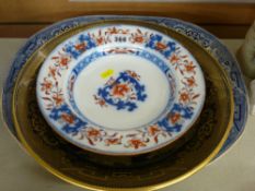 Black and gilt Willow pattern dish, a blue and white platter and a Newstone china flow blue bowl