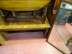 Glass topped Long John coffee table with gilt tooled leather insert and a classically styled