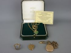 Brooks & Bentley fourteen carat gold and emerald heart pendant on a nine carat gold necklace, two